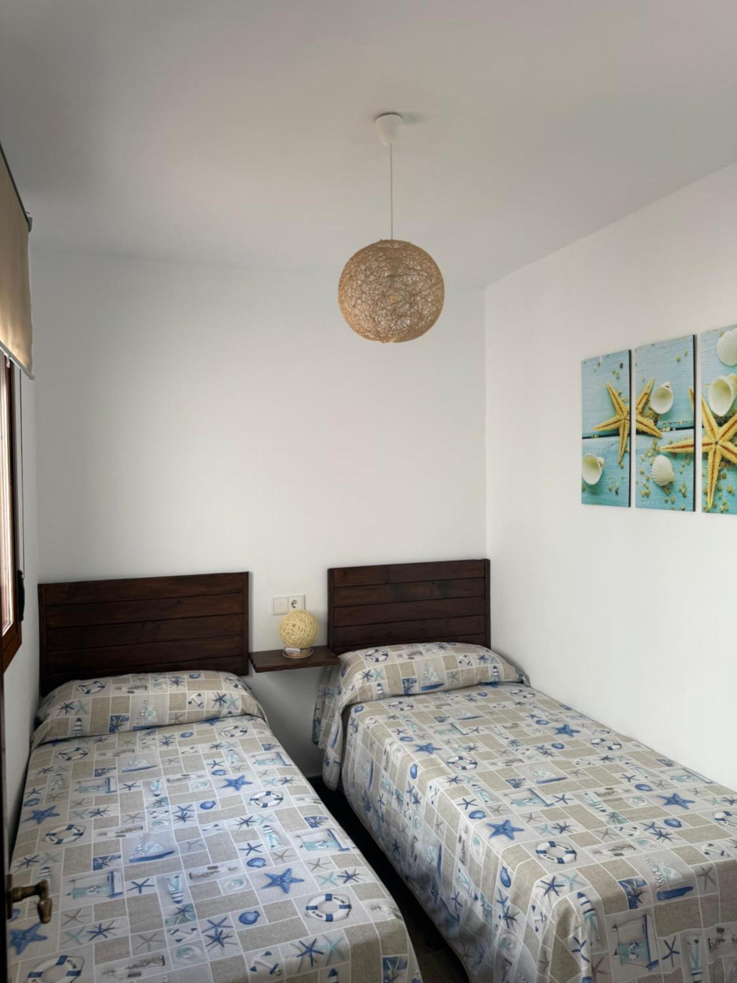 - M A N U E L A Apartment Bolonia